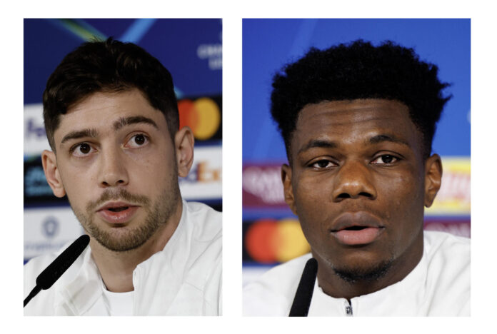 Combo de imágenes de archivo de los jugadores del Real Madrid Federico Valverde (izda) y Aurélien Tchouamén, durante una rueda de prensa. El Real Madrid anunció esta tarde que ha impuesto una sanción económica a Valverde y Tchouameni por el enfrentamiento que ambos tuvieron en el vestuario de la ciudad deportiva de Valdebebas. EFE/Chema Moya - Sergio Pérez
