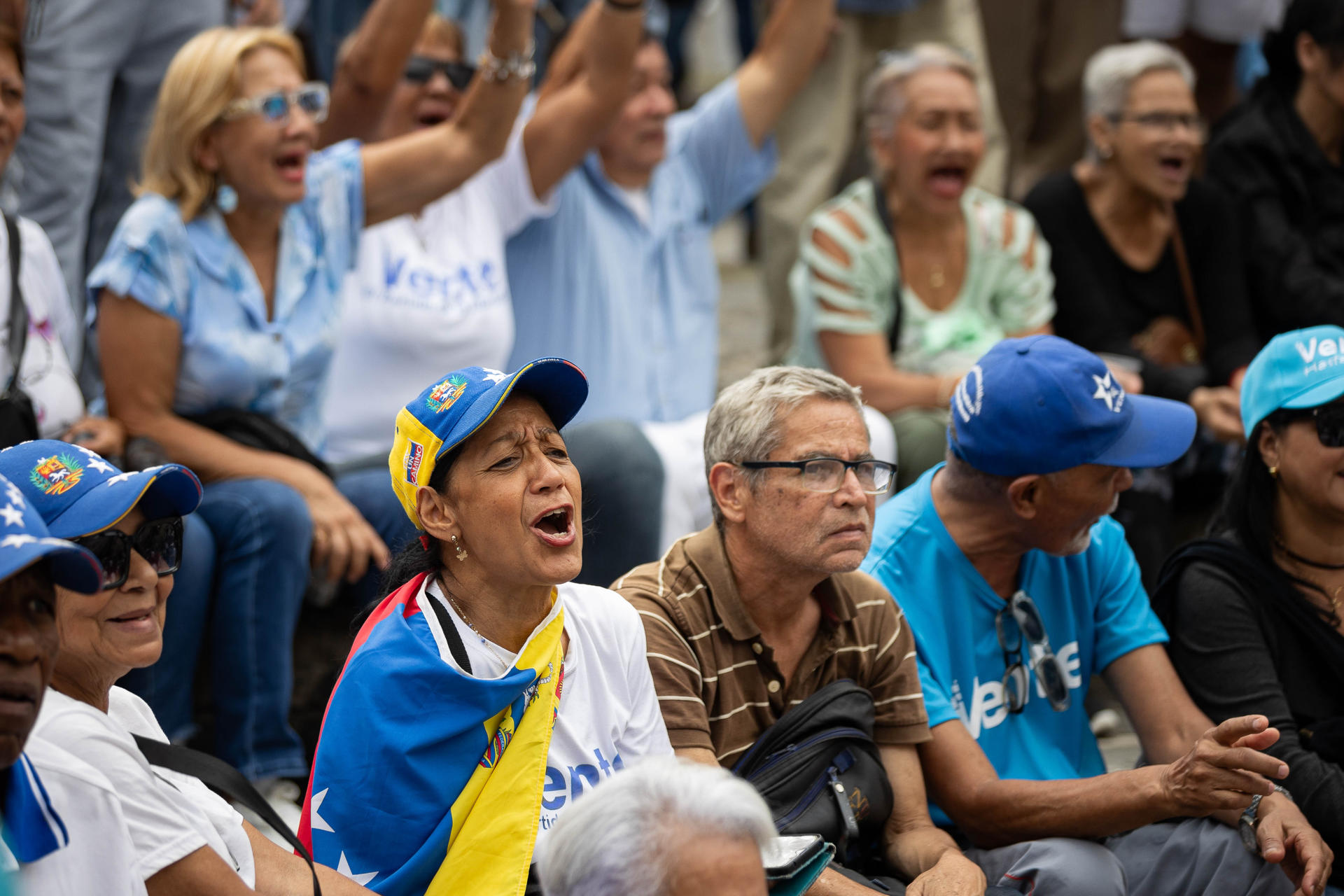 Personas participan en una actividad del partido Vente Venezuela este domingo, en Caracas (Venezuela). EFE/ Ronald Peña R
