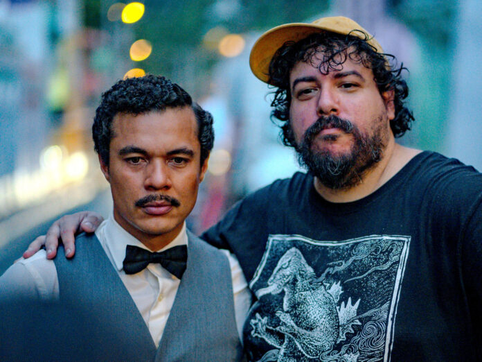 Fotografía cedida por Mikey Cordero donde aparece Ismael Cruz (i) quien representa a Pedro Albizu Campos en el cortometraje 'Mataron a Pedro' posando con el director Kristian Mercado (d), durante el rodaje de la cinta. El cortometraje 'Mataron a Pedro', que se presenta este jueves en Los Angeles Latino Film Festival, rememora la figura de Pedro Albizu Campos, el líder del Partido Nacionalista de Puerto Rico que estuvo preso más de 25 años por luchar por la soberanía de su isla natal e intentar liberarla del 