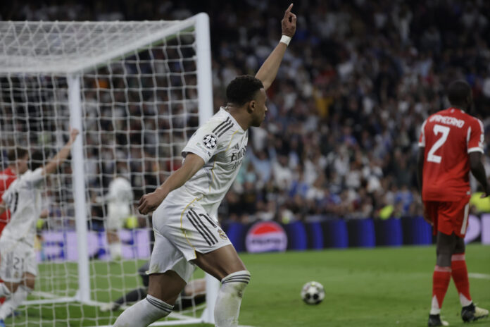 El delantero francés del Real Madrid, Kylian Mbappé, celebra su gol al Bayern Munich en foto de archivo de Juanjo Martín. EFE
