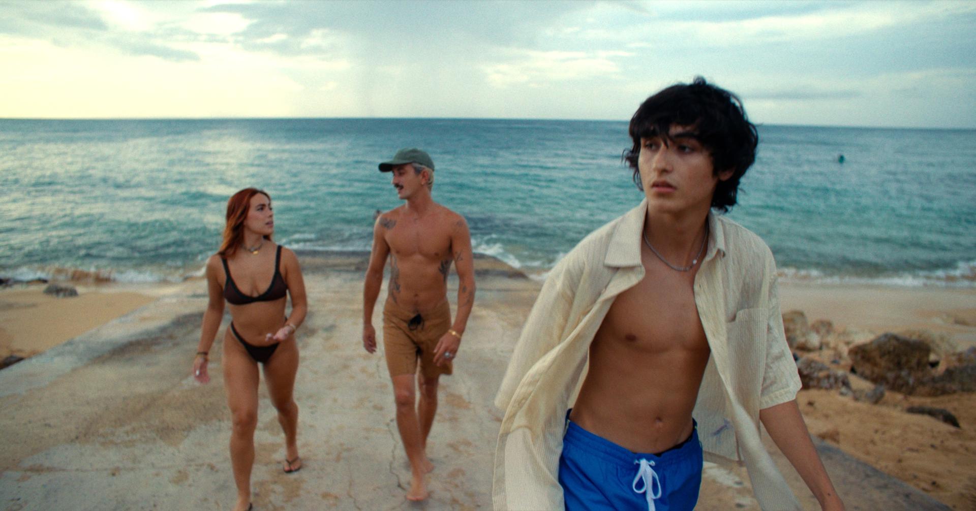 Fotograma cedido por M Ruiz Entertainment que muestra a Kiki Montilla como Kike, Paolo Jose Schoene como Luife, y Marcel Ruiz como Javi, durante una escena de la película 'Summer of Three' que se estrena este lunes en el festival de Tribeca, en Nueva York (EE.UU). EFE/ M Ruiz Entertainment
