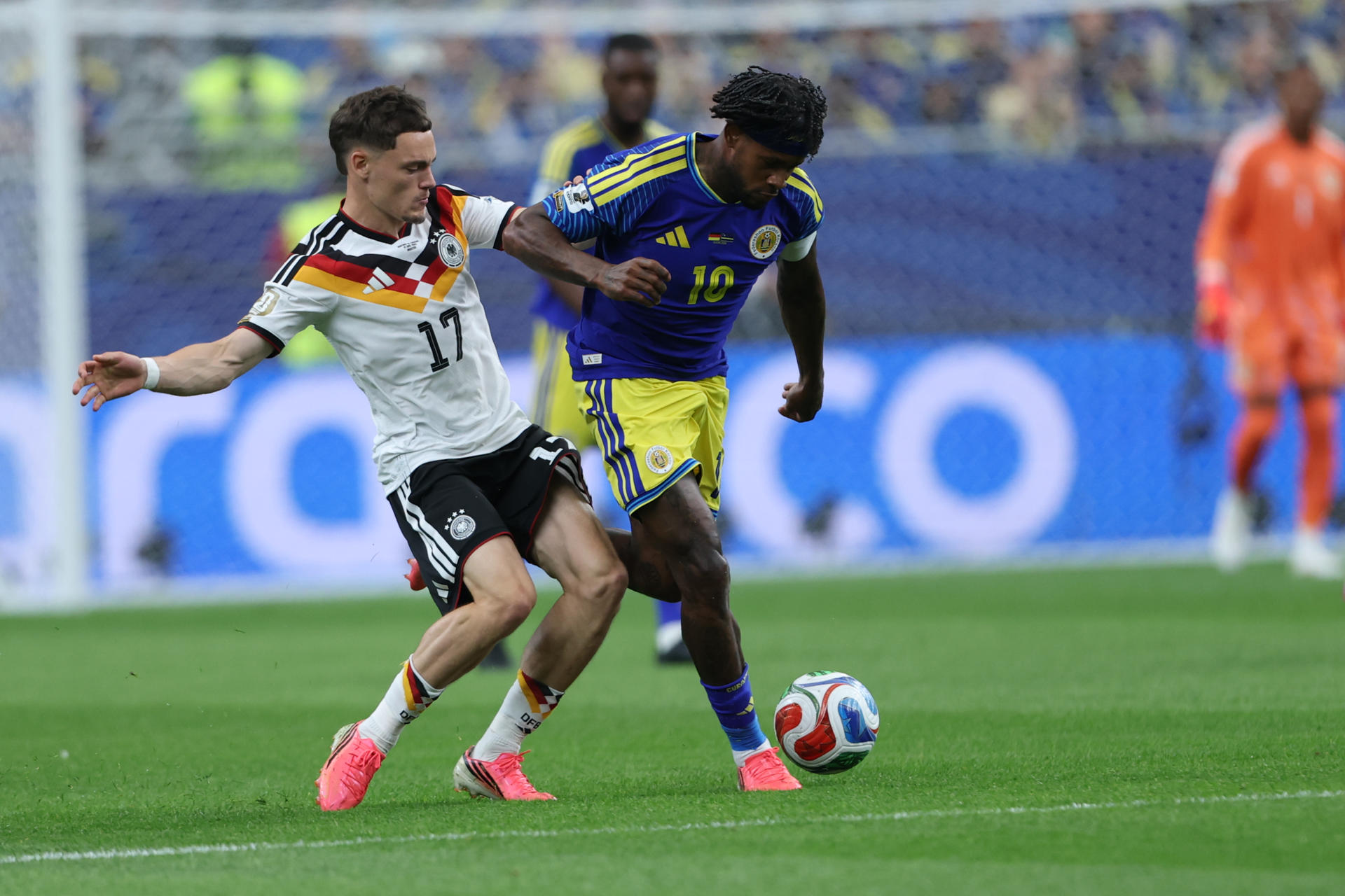 El centrocampista alemán Florian Wirtz, y el centrocampista de Curazao Leandro Bacuna, durante el partido del grupo C del Mundial 2026.-EFE/ Carlos Ramírez
