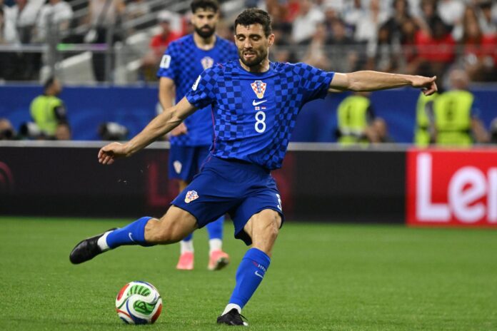 Mateo Kovacic, de Croacia, en acción durante el partido del Mundial 2026 ante Inglaterra. EFE/EPA/ALBERT PENA
