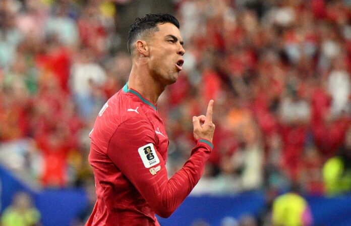 El jugador portugués Cristiano Ronaldo celebra el 1-0 durante el partido del Mundial en Houston, USA. . EFE/EPA/SAM WASSON
