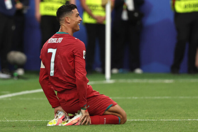 Cristiano Ronaldo de Portugal celebra un gol en el partido del Grupo K del Mundial de la FIFA 2026 entre Portugal y Uzbekistán en el estadio NRG en Houston (Estados Unidos)). EFE/ Kenneth Fernández
