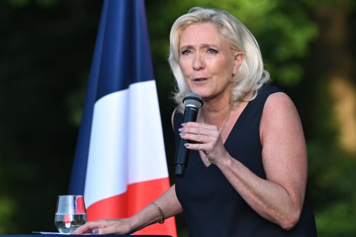 LIEVIN (France), 04/07/2026.- French MP Marine Le Pen, president of the Rassemblement National parliamentary group in the French National Assembly, delivers a speech during the Country Fair (Fete Champetre) event organized by the French far-right party Rassemblement National in Lievin, France, 04 July 2026. (Francia) EFE/EPA/FIRAS ABDULLAH
