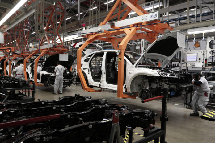 Fotografía de archivo de la planta automotriz alemana Audi en el municipio de San José Chiapa, en el estado mexicano de Puebla. EFE/Hugo Ortuño

