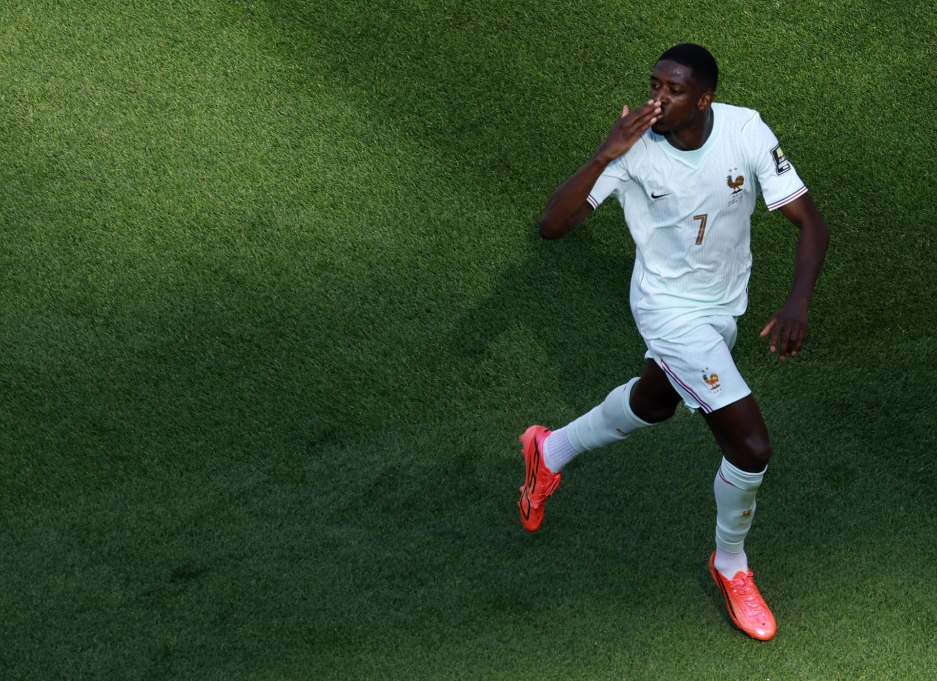 El jugador Ousmane Dembélé, de Francia, celebra después de marcar el gol del 2-0 durante el partido de cuartos de final de la Copa Mundial de la FIFA 2026. EFE/EPA/GREG M. COOPER
