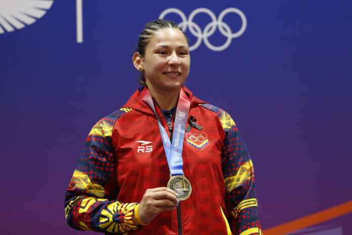 Karen León de Venezuela posa con la medalla de oro este lunes, al ganar en la categoría 78 kg de judo durante los XXV Juegos Centroamericanos y del Caribe Santo Domingo 2026. EFE/ Rodrigo Sura

